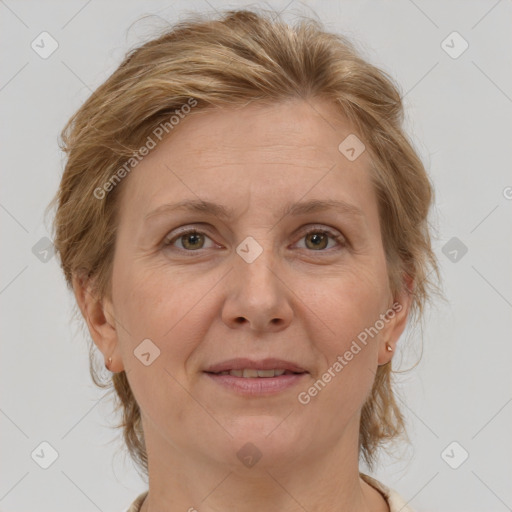 Joyful white adult female with medium  brown hair and grey eyes