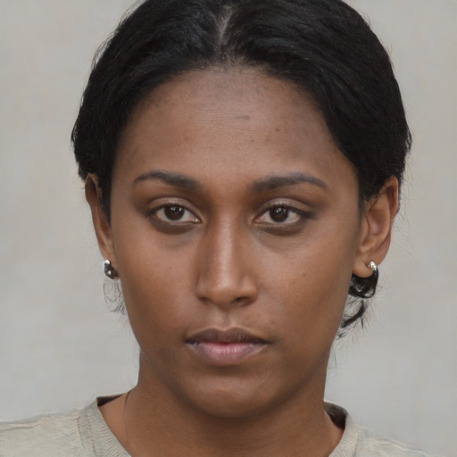Neutral asian young-adult female with short  brown hair and brown eyes