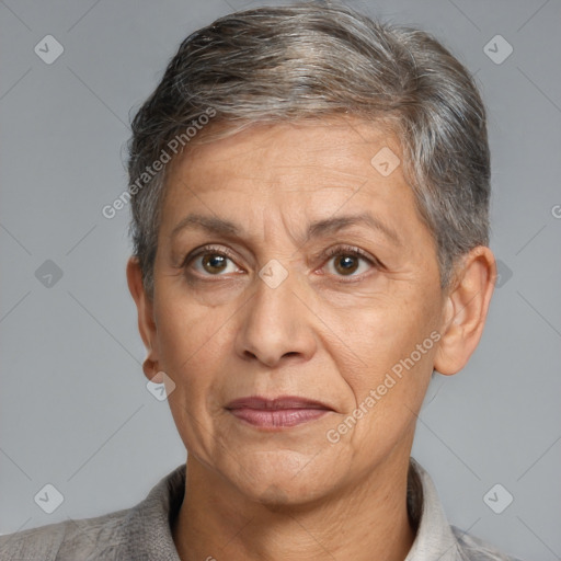 Joyful white middle-aged female with short  brown hair and brown eyes