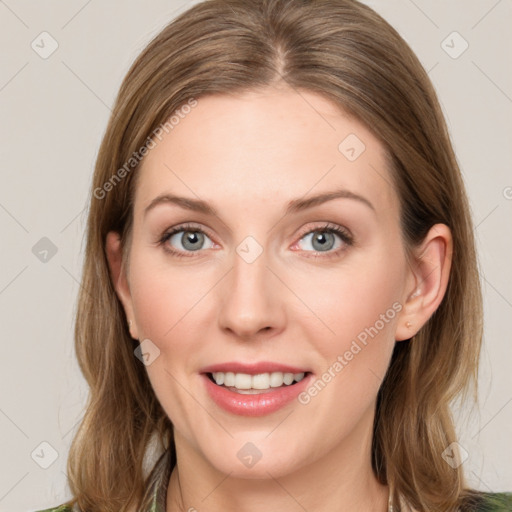 Joyful white young-adult female with medium  brown hair and green eyes