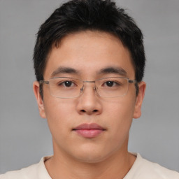 Neutral asian young-adult male with short  brown hair and brown eyes