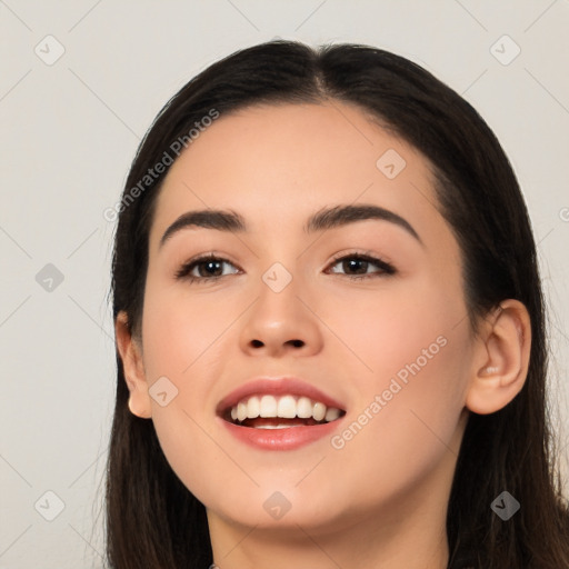 Joyful white young-adult female with long  black hair and brown eyes