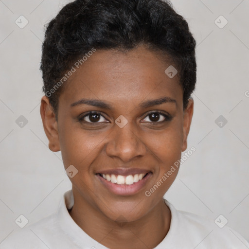 Joyful black young-adult female with short  brown hair and brown eyes