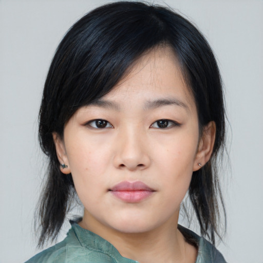 Neutral asian young-adult female with medium  black hair and brown eyes