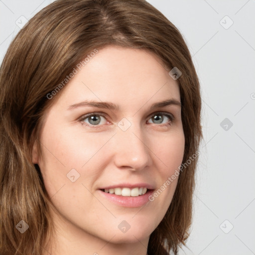 Joyful white young-adult female with long  brown hair and green eyes