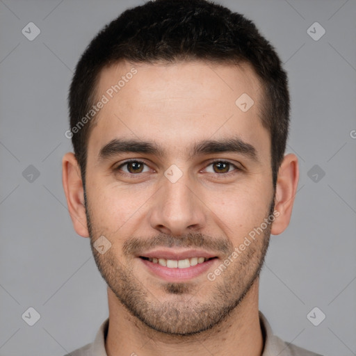 Joyful white young-adult male with short  brown hair and brown eyes