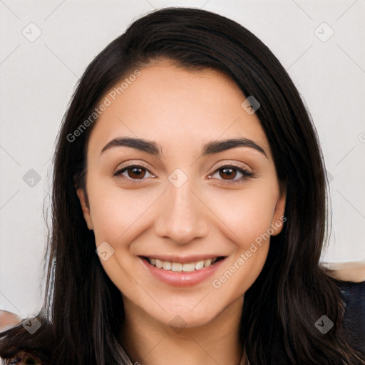 Joyful white young-adult female with long  black hair and brown eyes