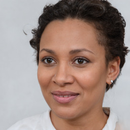 Joyful white adult female with short  brown hair and brown eyes