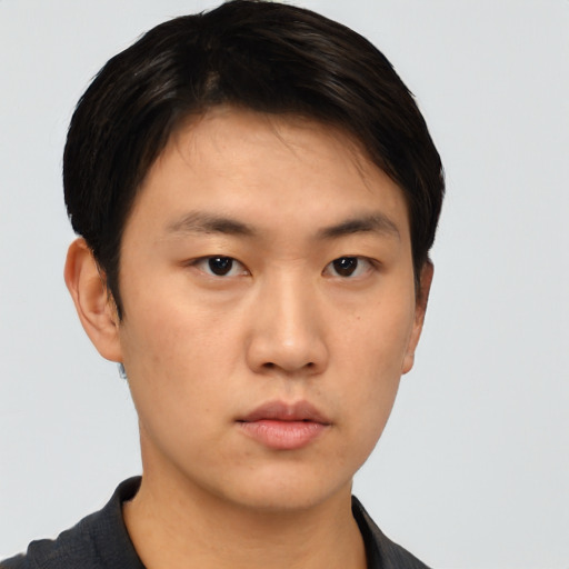 Neutral asian young-adult male with short  brown hair and brown eyes