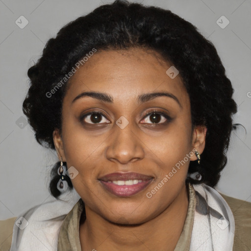 Joyful black young-adult female with short  brown hair and brown eyes