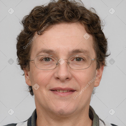 Joyful white adult female with short  brown hair and grey eyes