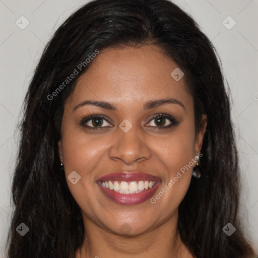 Joyful black young-adult female with long  brown hair and brown eyes