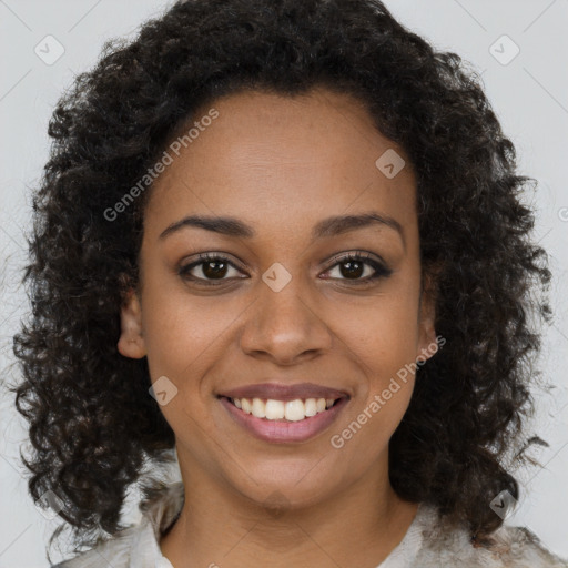 Joyful black young-adult female with medium  brown hair and brown eyes