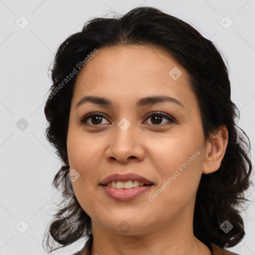 Joyful latino young-adult female with medium  brown hair and brown eyes