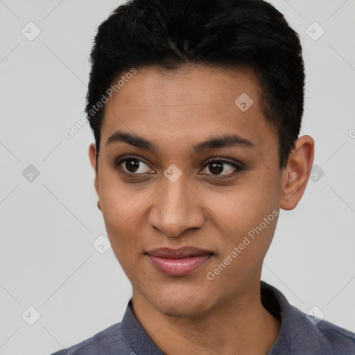 Joyful latino young-adult female with short  black hair and brown eyes