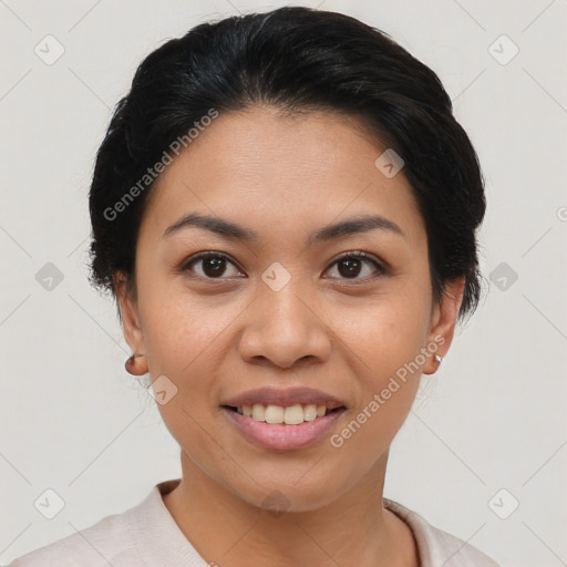 Joyful asian young-adult female with short  black hair and brown eyes