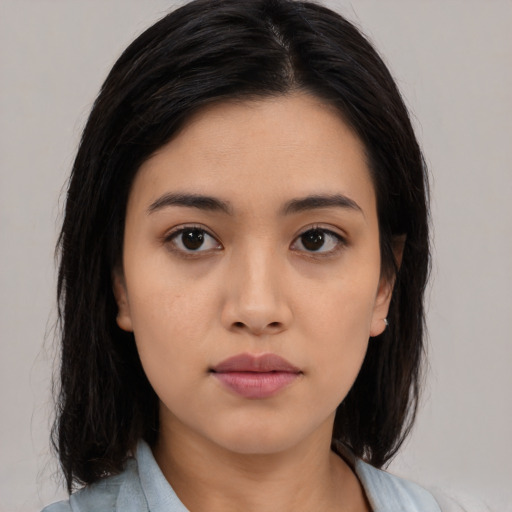 Neutral asian young-adult female with medium  black hair and brown eyes
