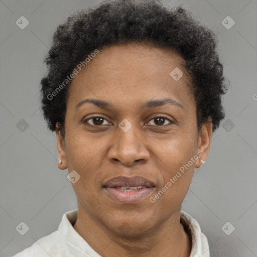 Joyful black adult female with short  brown hair and brown eyes