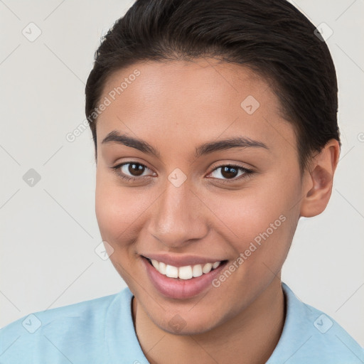 Joyful white young-adult female with short  brown hair and brown eyes