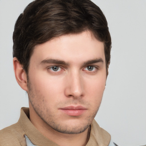 Neutral white young-adult male with short  brown hair and brown eyes