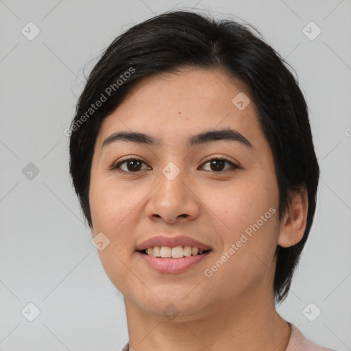 Joyful asian young-adult female with medium  black hair and brown eyes