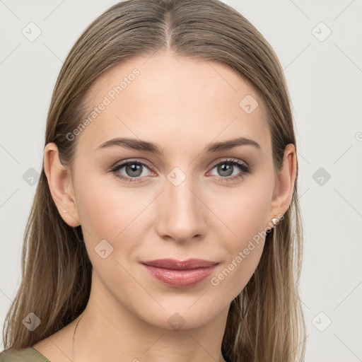 Joyful white young-adult female with long  brown hair and grey eyes