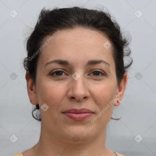 Joyful white adult female with short  brown hair and brown eyes