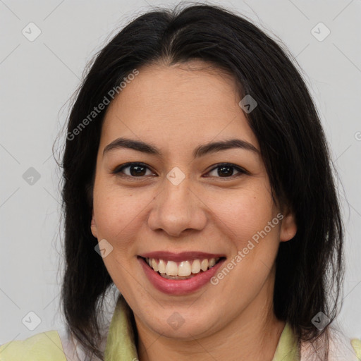 Joyful latino young-adult female with medium  brown hair and brown eyes