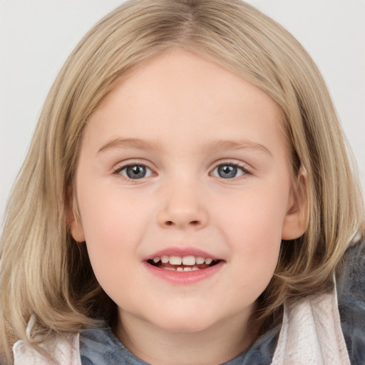 Joyful white child female with medium  brown hair and grey eyes