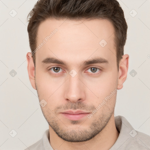 Neutral white young-adult male with short  brown hair and brown eyes