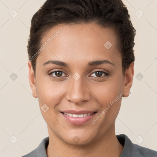 Joyful white young-adult female with short  brown hair and brown eyes