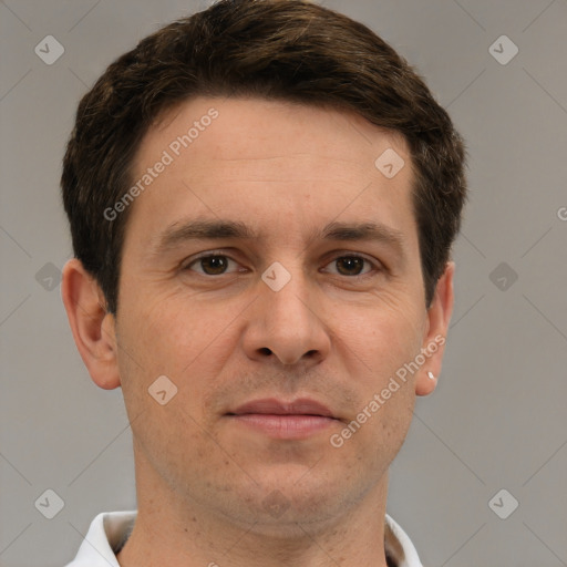 Joyful white adult male with short  brown hair and brown eyes