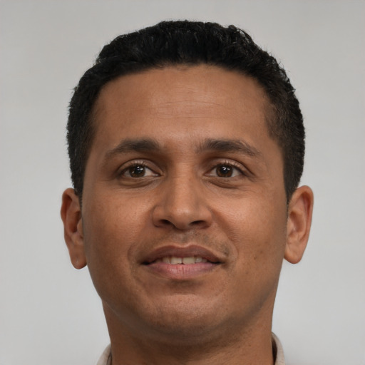Neutral latino young-adult male with short  brown hair and brown eyes