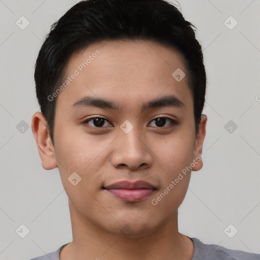 Joyful asian young-adult male with short  black hair and brown eyes