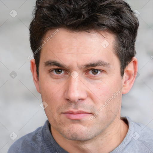 Neutral white adult male with short  brown hair and brown eyes