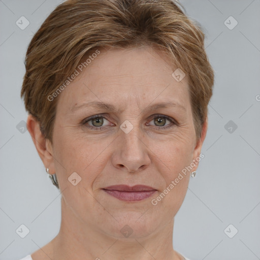 Joyful white adult female with short  brown hair and grey eyes