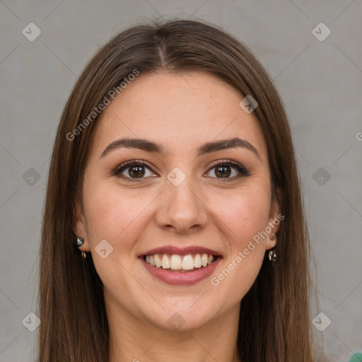 Joyful white young-adult female with long  brown hair and green eyes