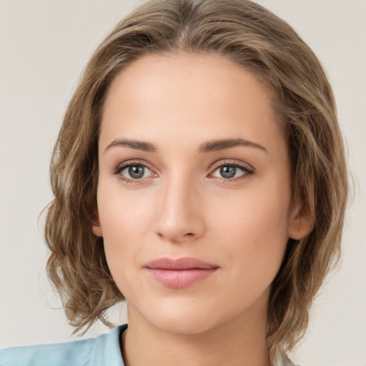 Neutral white young-adult female with medium  brown hair and green eyes