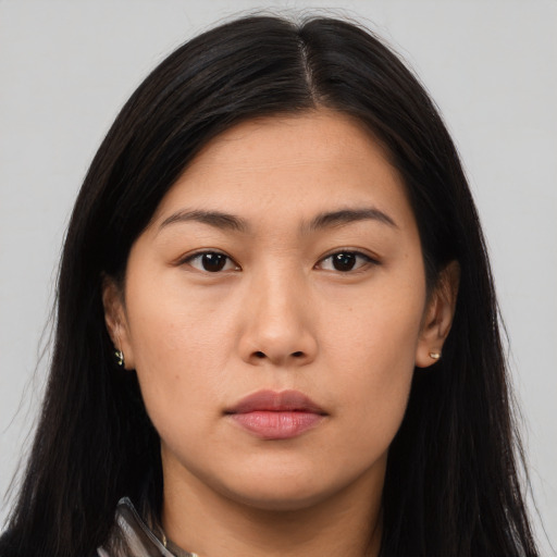 Neutral asian young-adult female with long  brown hair and brown eyes