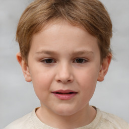 Joyful white child female with short  brown hair and brown eyes