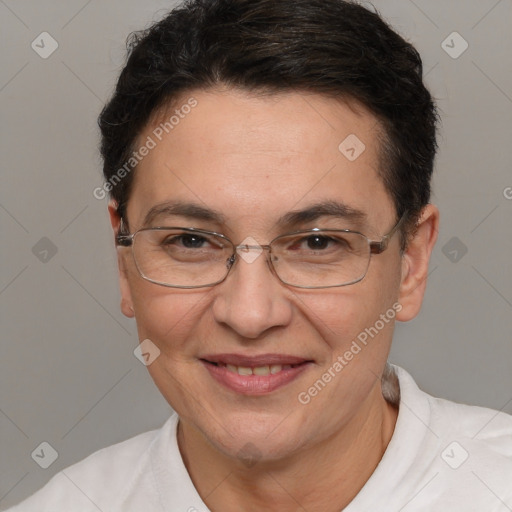 Joyful white adult female with short  brown hair and brown eyes