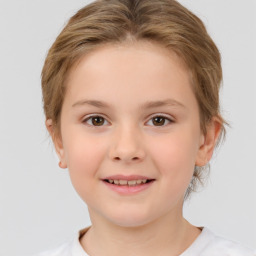 Joyful white child female with short  brown hair and brown eyes