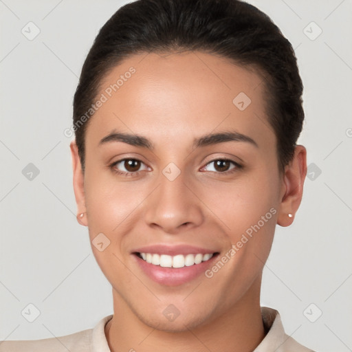 Joyful white young-adult female with short  brown hair and brown eyes