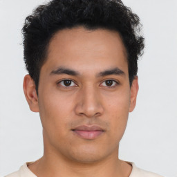 Neutral asian young-adult male with short  brown hair and brown eyes