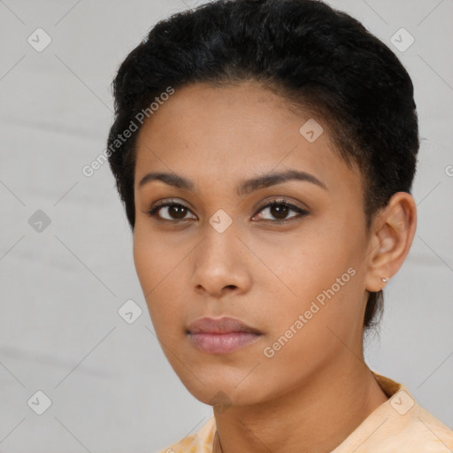 Neutral black young-adult female with short  black hair and brown eyes