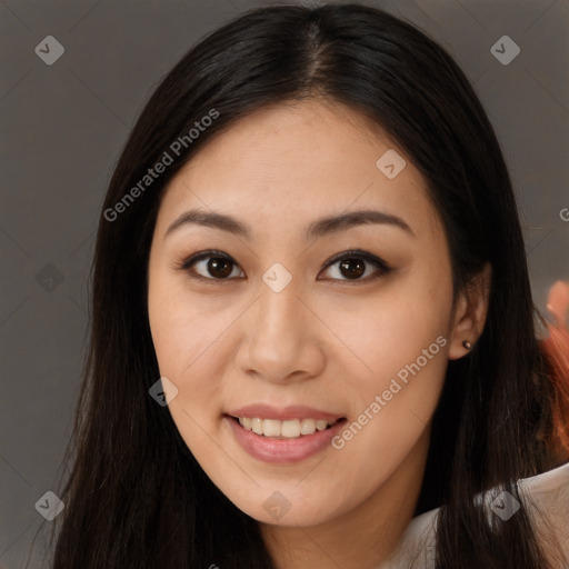 Joyful asian young-adult female with long  brown hair and brown eyes