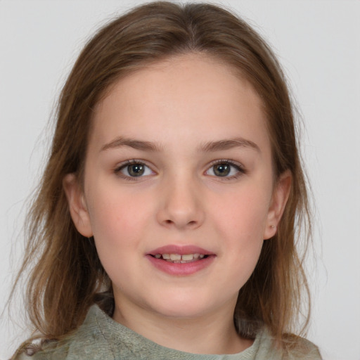 Joyful white child female with medium  brown hair and grey eyes