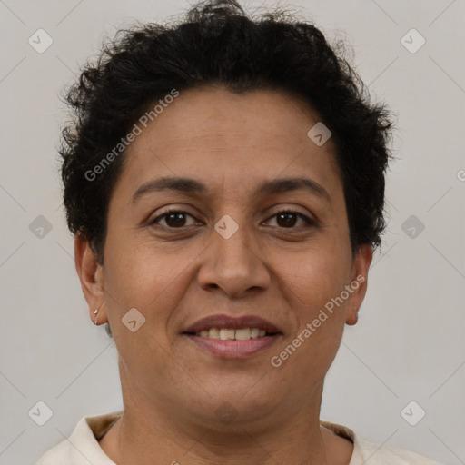 Joyful latino adult female with short  brown hair and brown eyes