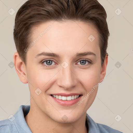 Joyful white young-adult female with short  brown hair and grey eyes