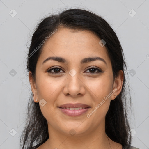 Joyful latino young-adult female with medium  brown hair and brown eyes